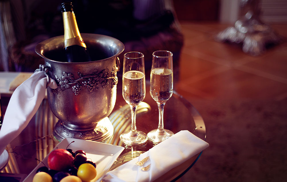 Taittinger and sliced fruit